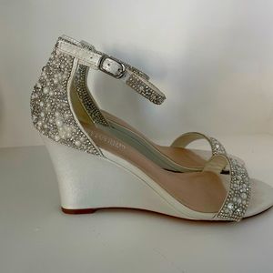 Crystal embellished metallic wedges.